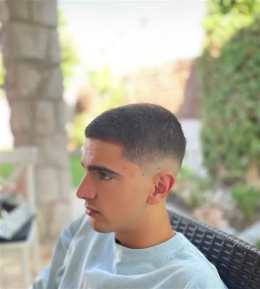 Short crop with a mid skin fade